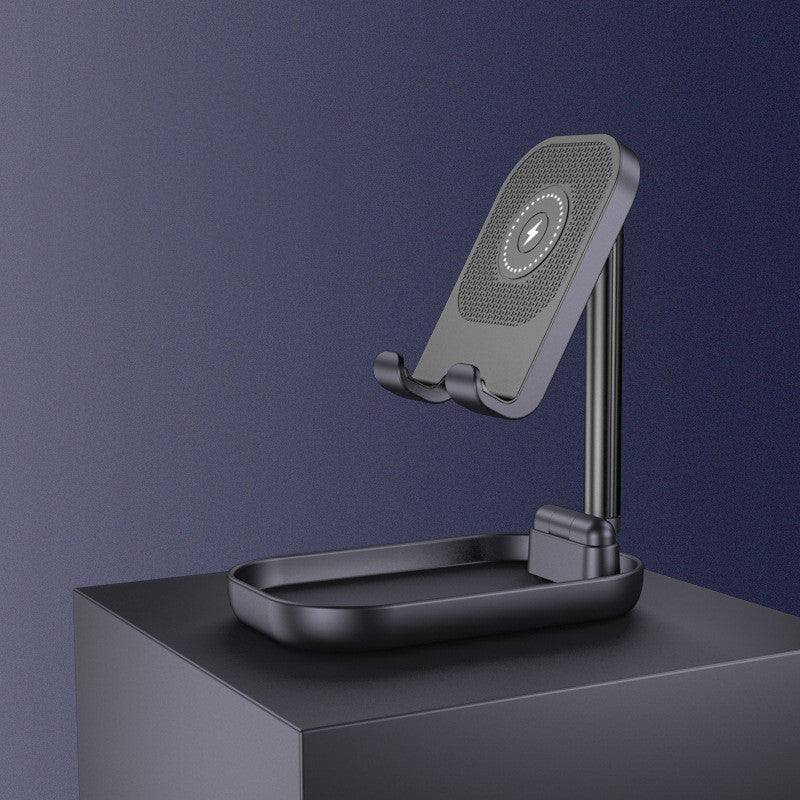 Black folding phone holder with wireless charging base on gray surface