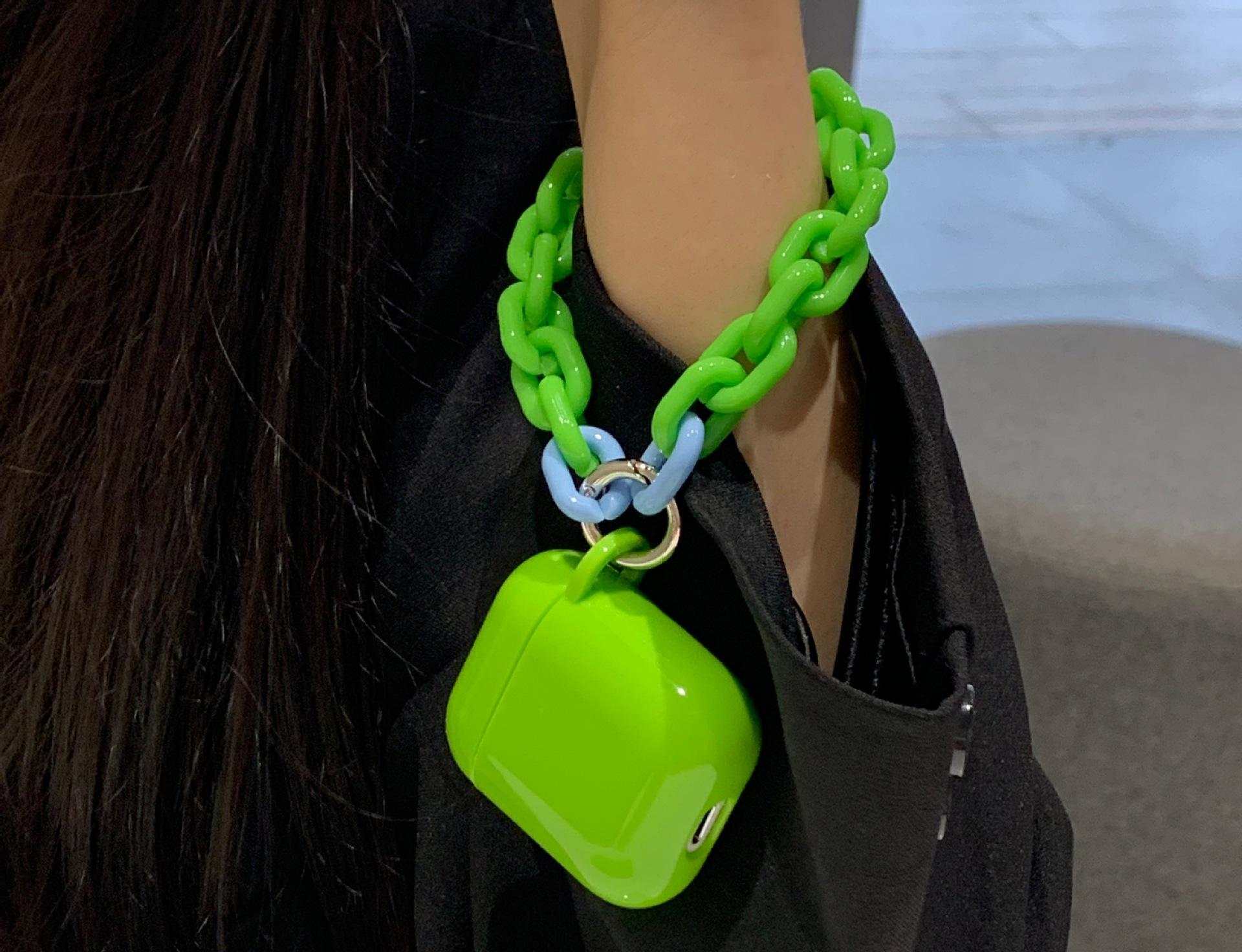 Green silicone Apple Airpods protective sleeve with chain attached to wrist